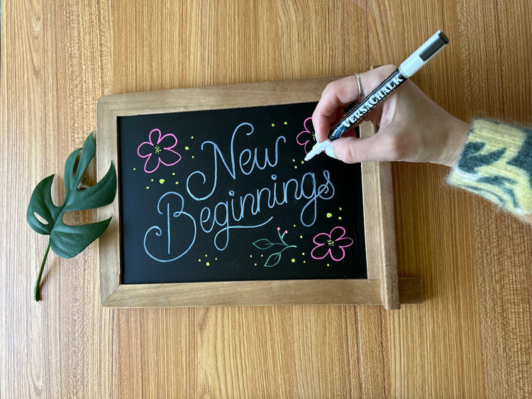 Goal setting for new year with chalk marker and chalk board